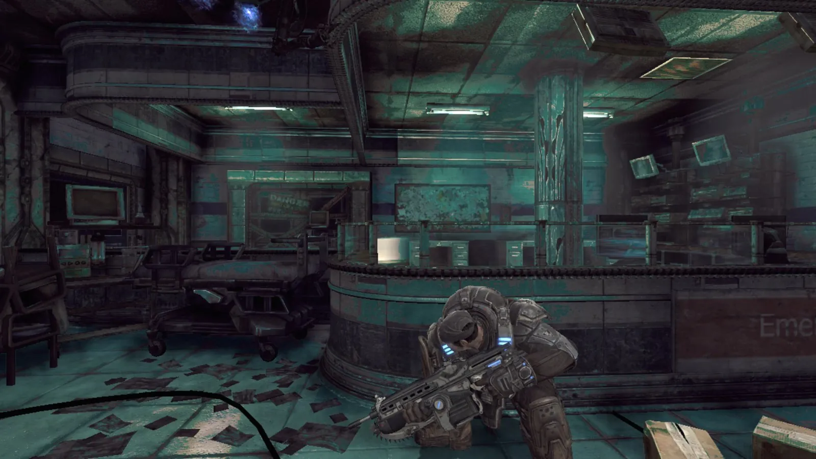 Act 1, Jacinto Med: Marcus Fenix crouched in front of the hospital reception counter, with gurneys and scattered papers behind him